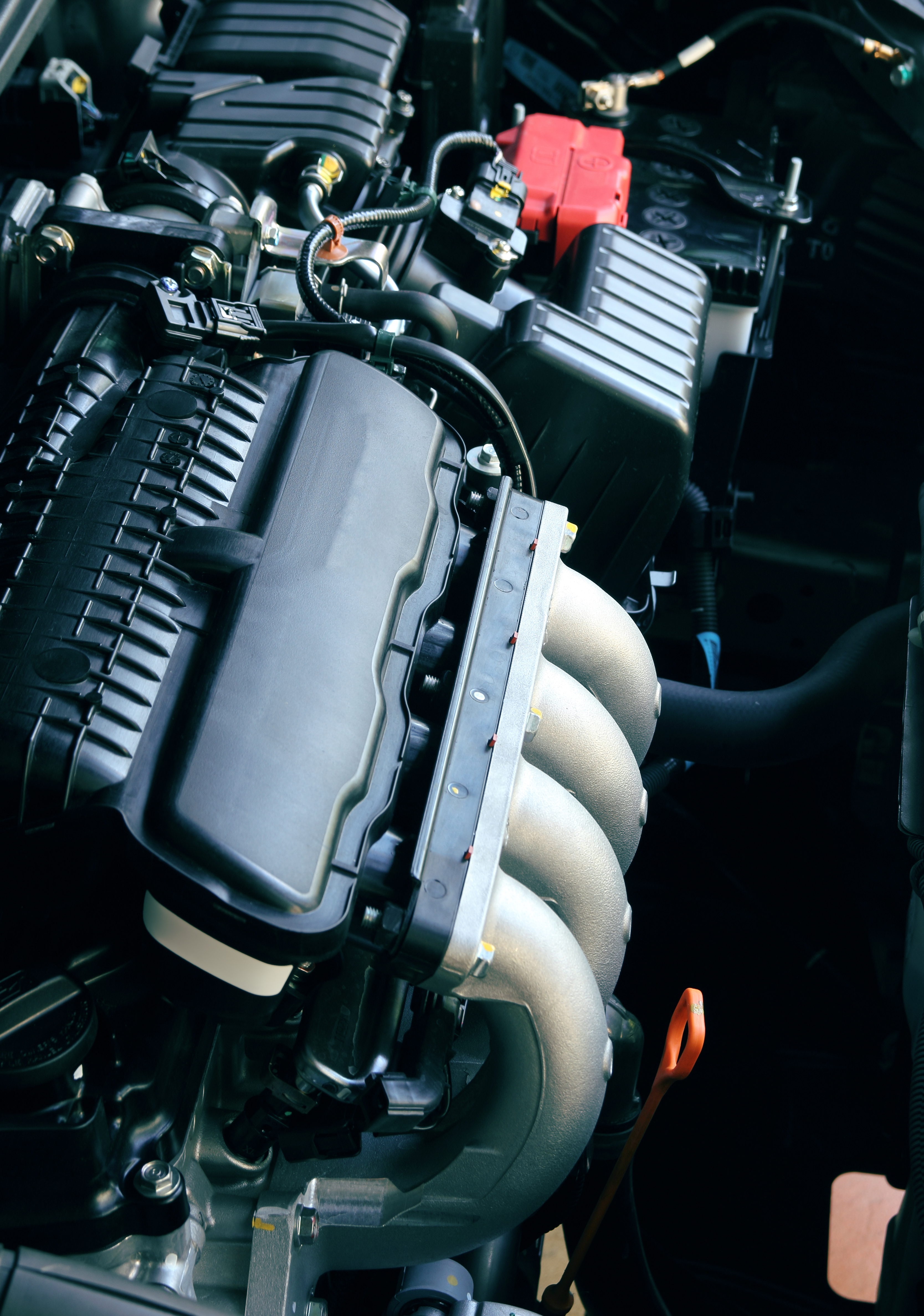 Close-up of a car engine during servicing and maintenance